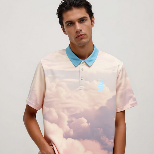 Man wearing a polo shirt with a cloud pattern on a plain background