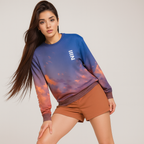 Woman wearing a colorful sweatshirt and orange shorts on a white background